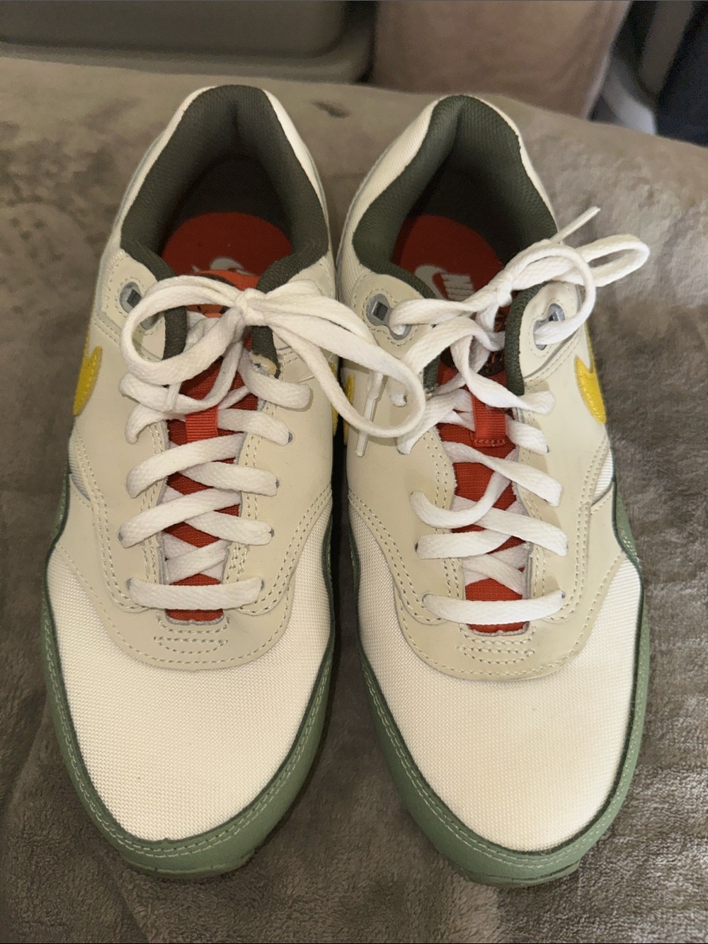 Nike White Sneakers with Green Trim and Yellow Detail